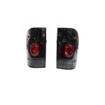 Focos traseros Toyota Hilux 98-03 fondo negro - Imagen 2