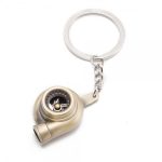 Llavero deportivo turbo metálico color bronce dorado regalo